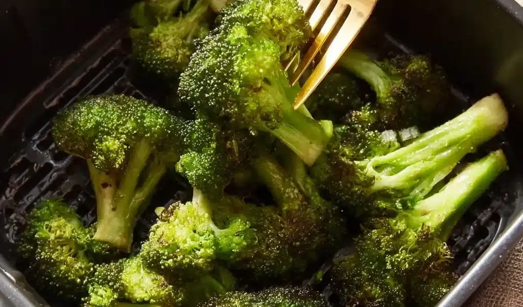 Crispy Air Fryer Broccoli in a bowl, showcasing healthy and tasty cooking.