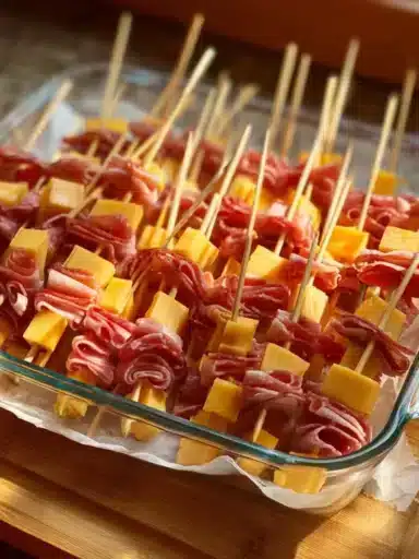 Delicious charcuterie on a stick featuring meats and cheeses.