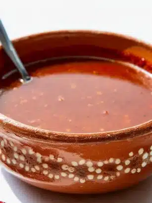Chili de Arbol Salsa recipe ingredients and vibrant finished salsa in a bowl