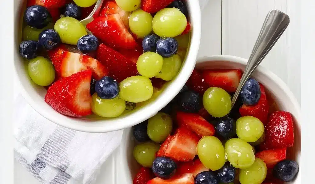 Honey Lime Fruit Salad with a variety of fresh fruits and a lime dressing